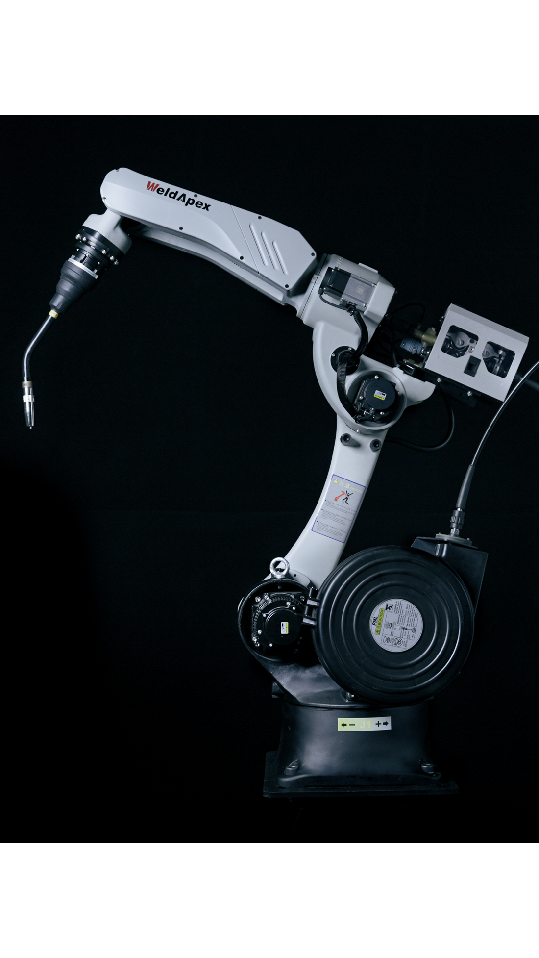 Robotic arm with a tool on a black background